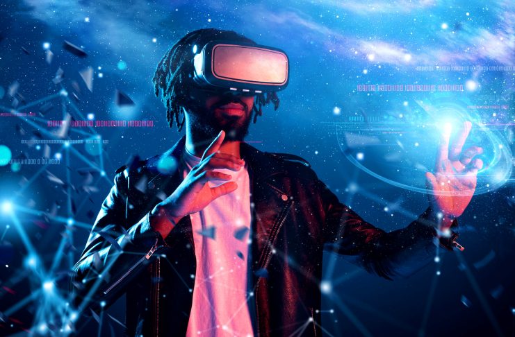 Boy with VR glasses play with a videogame
