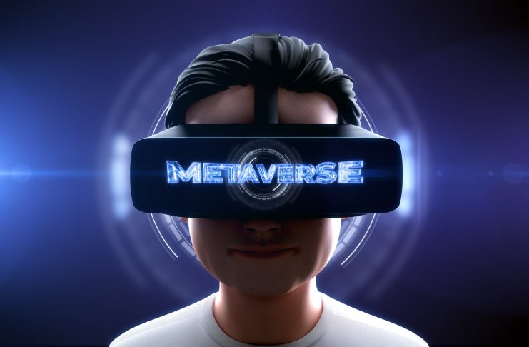 Text "METAVERSE" on VR Headset screen. Close-up shot of a young man wearing VR Headset experiencing 3D virtual reality. Technology related Metaverse concept. 3D Rendering.