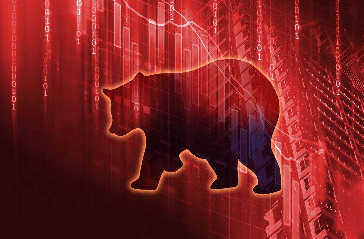 silhouette form of bear on financial stock market graph represent stock market crash or down trend investment