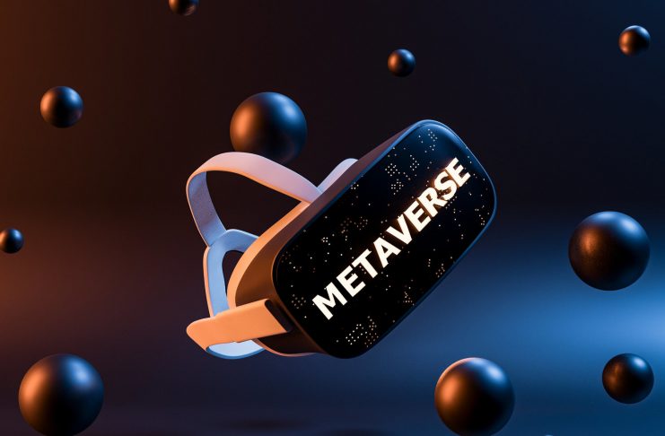 virtual reality glasses with metal spheres floating around and illuminated sign with the word METAVERSE. futuristic concept of video games, NFT, VR and crypto. 3d rendering